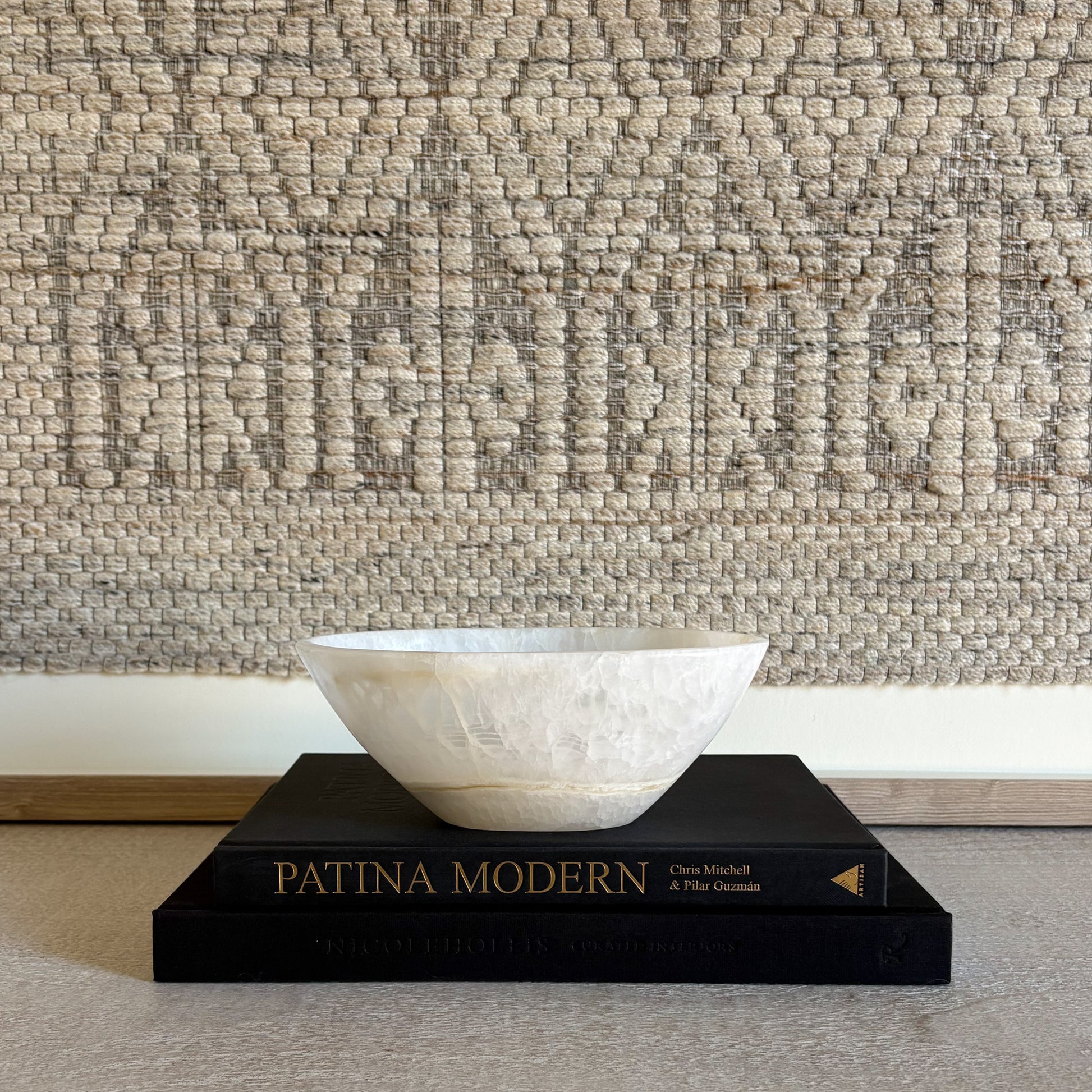 Small hand-carved white onyx bowl in natural stone, luxury decorative accent with soft veining