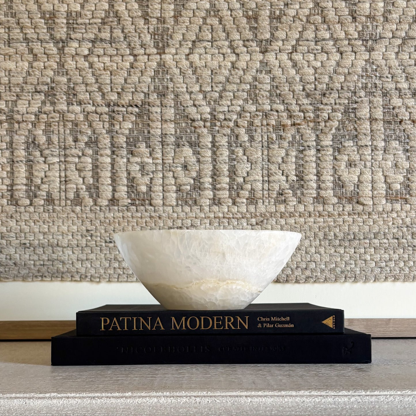 Hand-carved white onyx bowl showcasing natural veining and polished stone finish