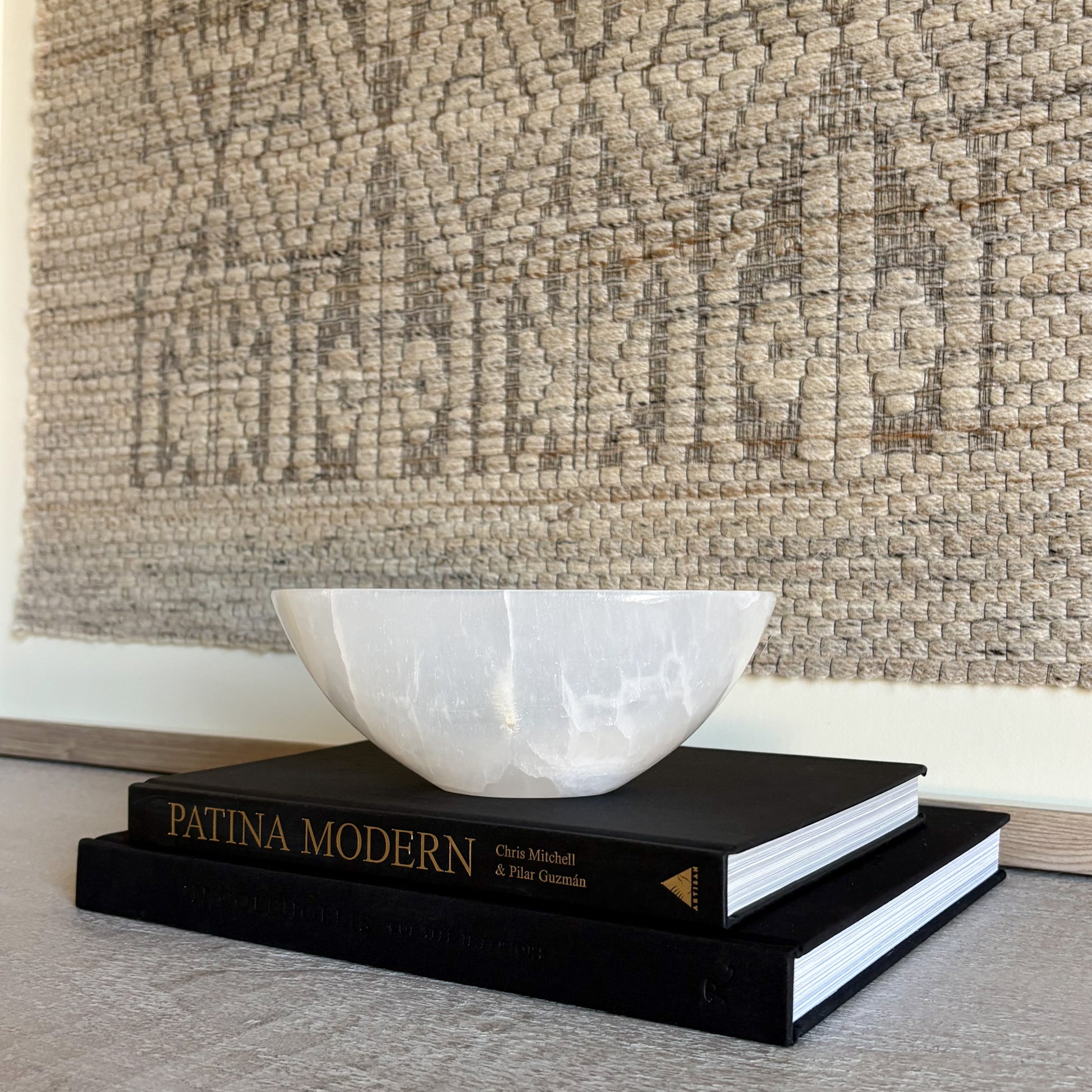 Hand-carved white onyx bowl showcasing natural veining and polished stone finish