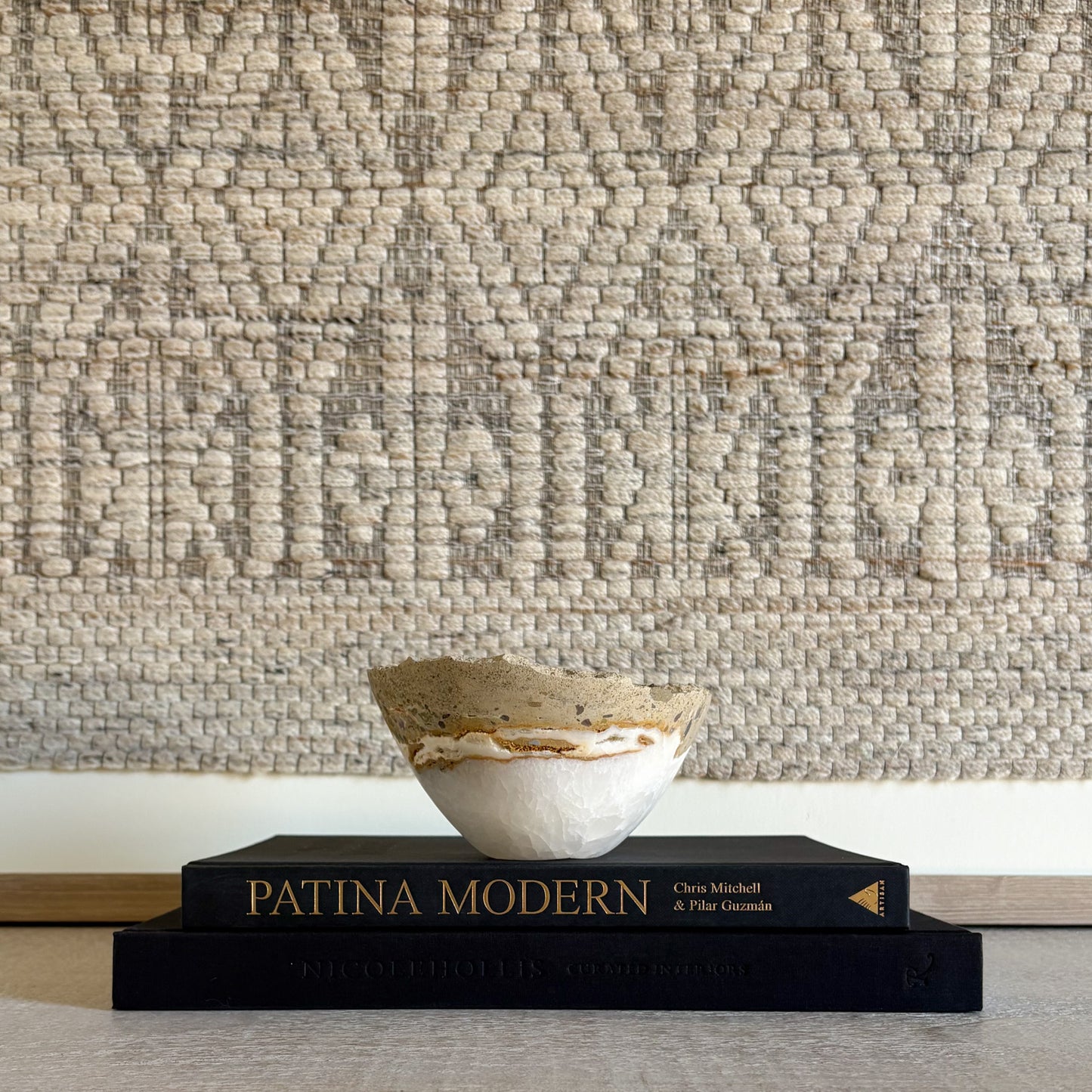 Luxury white onyx decorative bowl styled on a coffee table in a refined modern interior