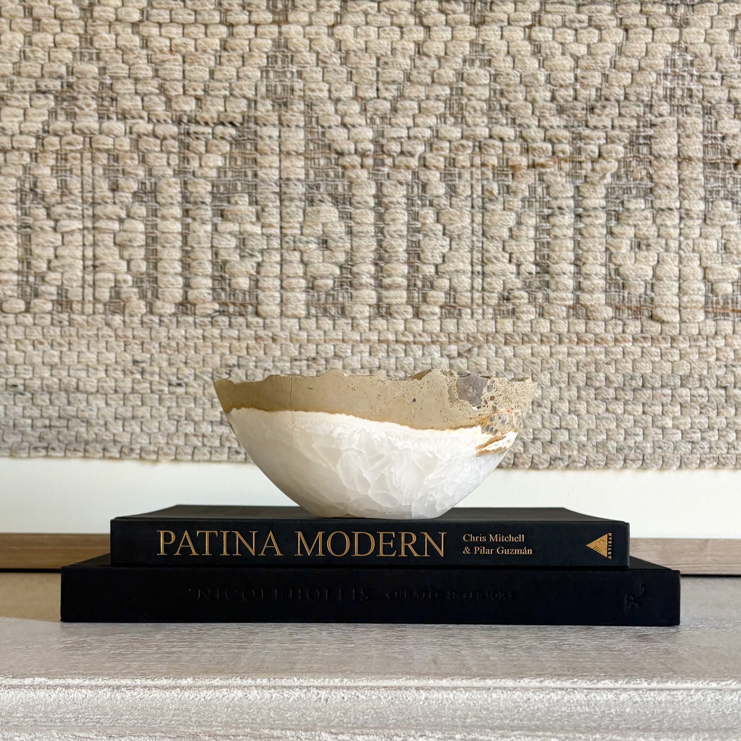 Hand-carved white onyx bowl showcasing natural veining and polished stone finish