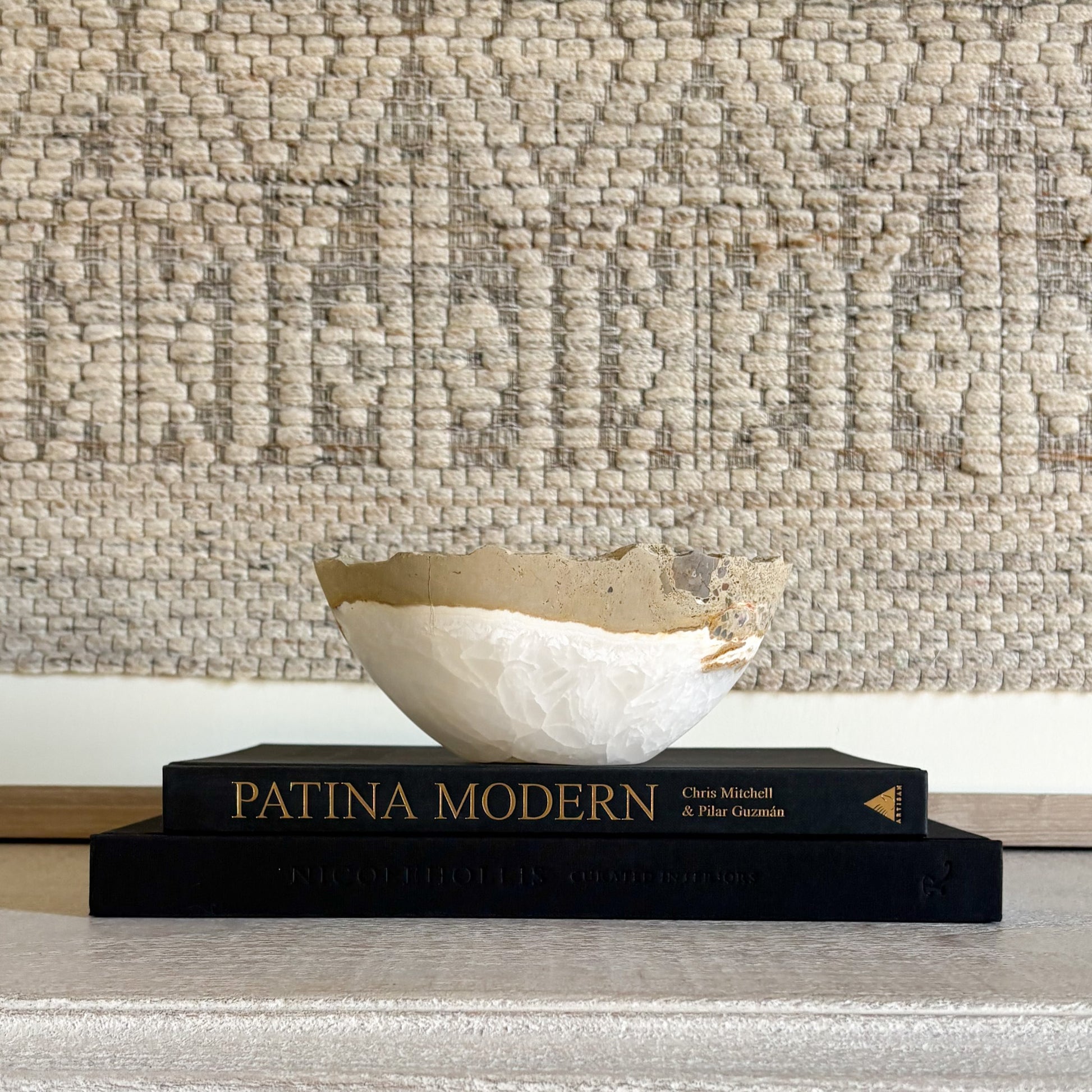 Hand-carved white onyx bowl showcasing natural veining and polished stone finish