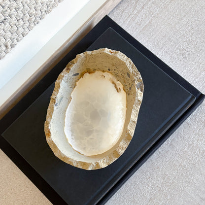 Close-up of natural white onyx stone bowl highlighting translucent texture and artisan craftsmanship