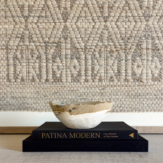 Small hand-carved white onyx bowl in natural stone, luxury decorative accent with soft veining