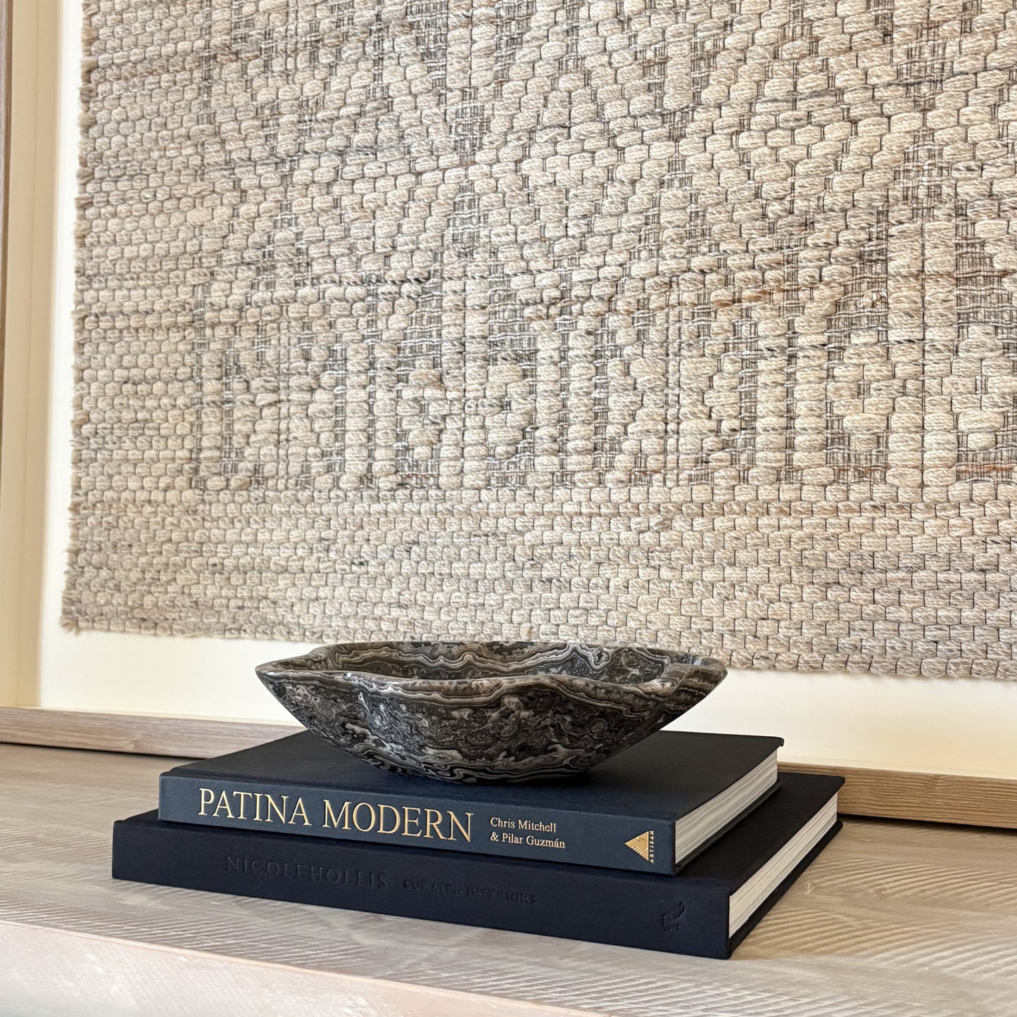 One-of-a-kind small hand-carved zebra onyx bowl used as a natural stone home décor accent