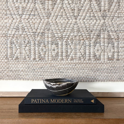 Small hand carved zebra onyx bowl with natural black and white striped veining