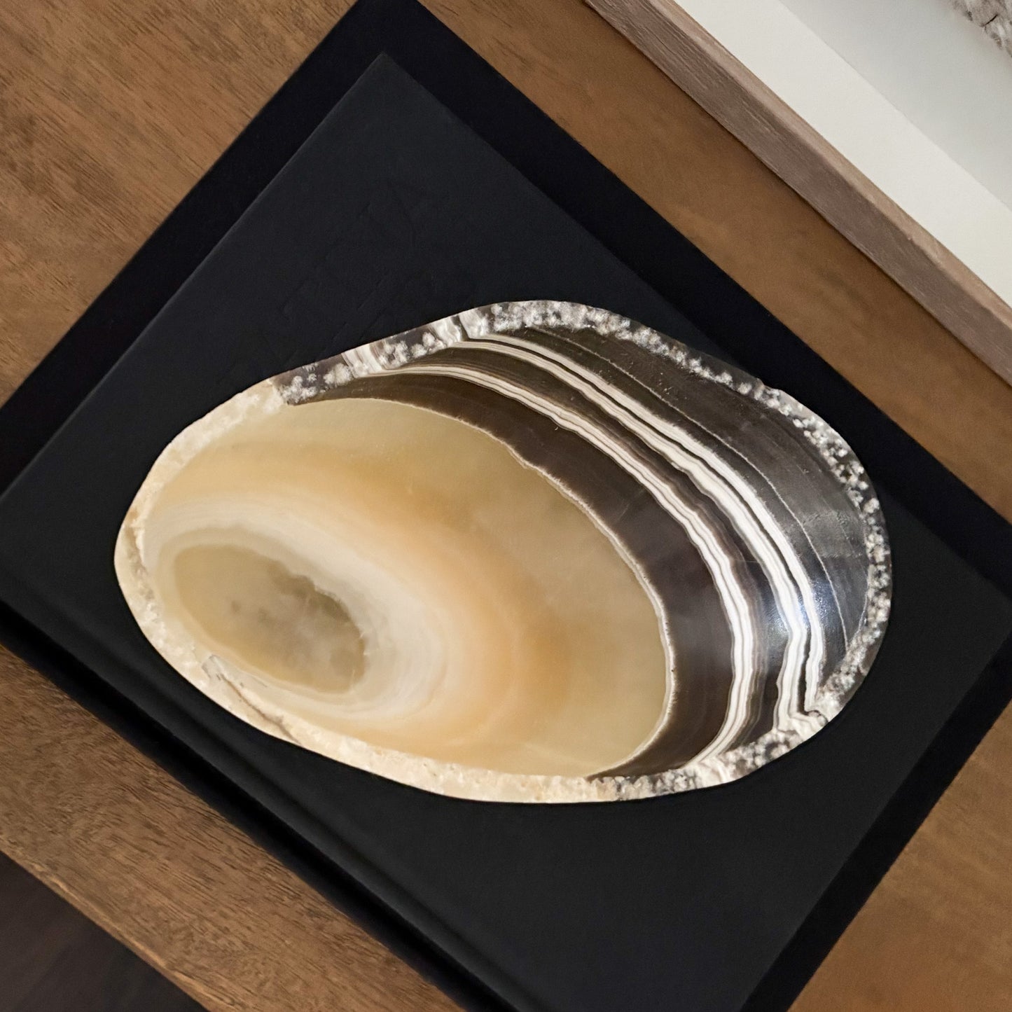 Decorative natural zebra onyx bowl with polished finish and unique earth-formed patterns