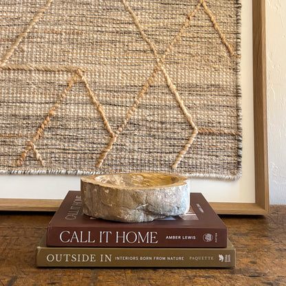 Small petrified wood catchall bowl with rich brown and tan mineral striations