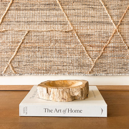 Small petrified wood bowl from Indonesia with polished fossil stone grain