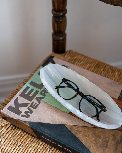 White onyx canoe catchall bowl with polished natural finish