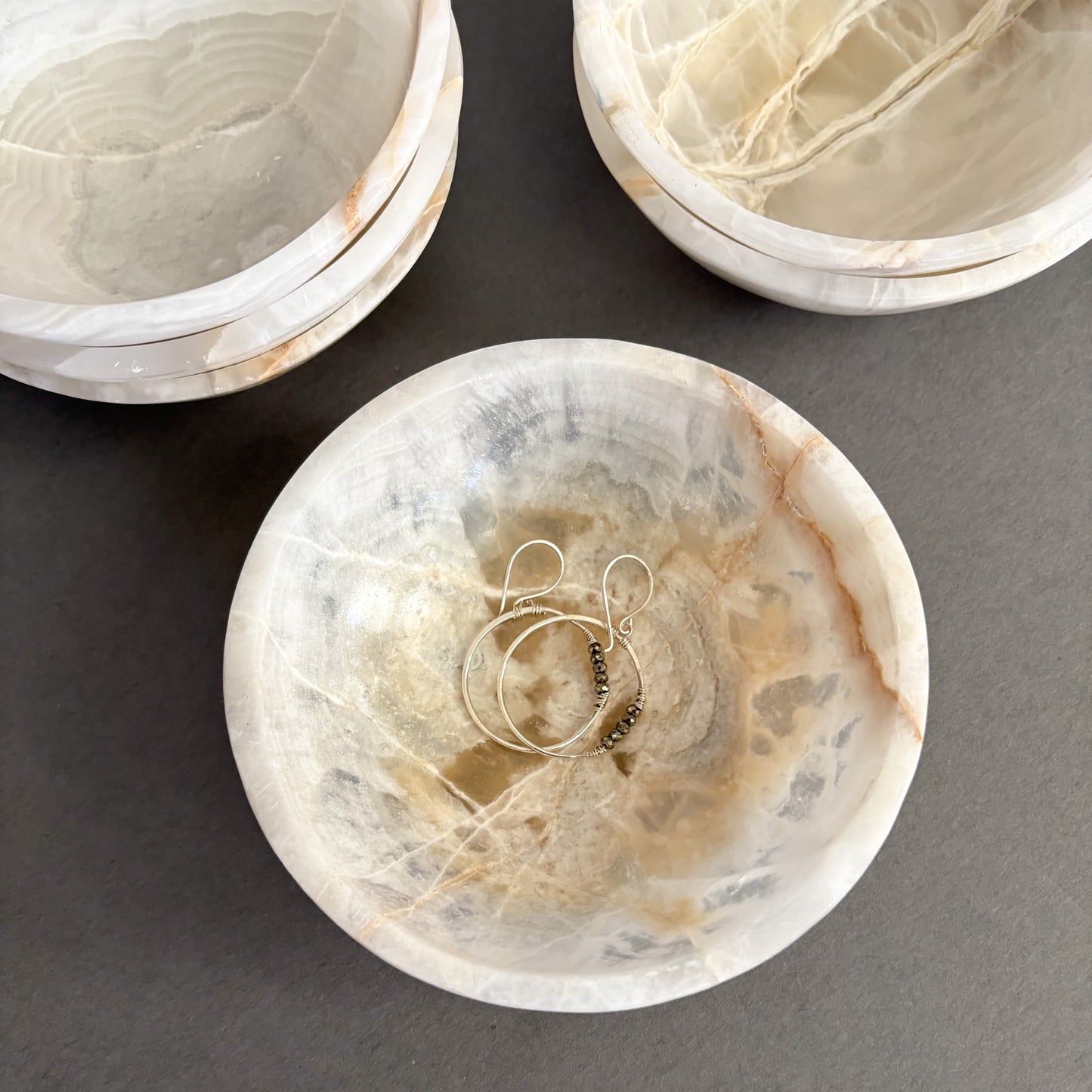 Natural stone trinket dish with soft ivory and gray veining