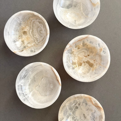 Decorative white stone dish for jewelry organization and home décor