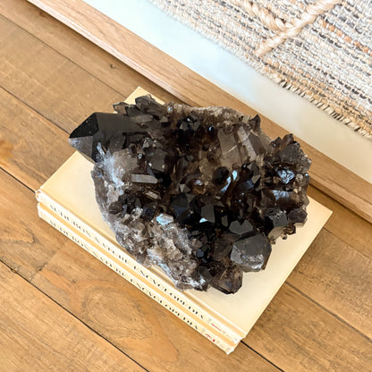 Raw smoky quartz crystal cluster with earthy brown crystals and natural formation
