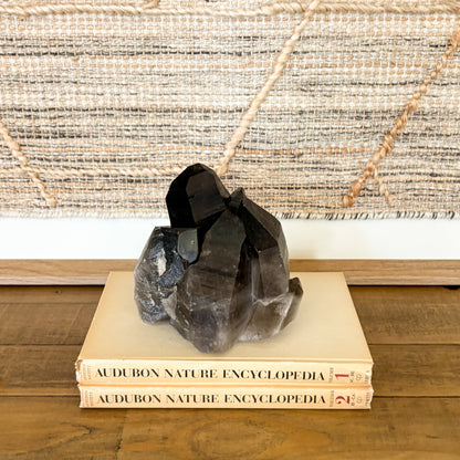 Raw smoky quartz crystal cluster with earthy brown crystals and natural formation