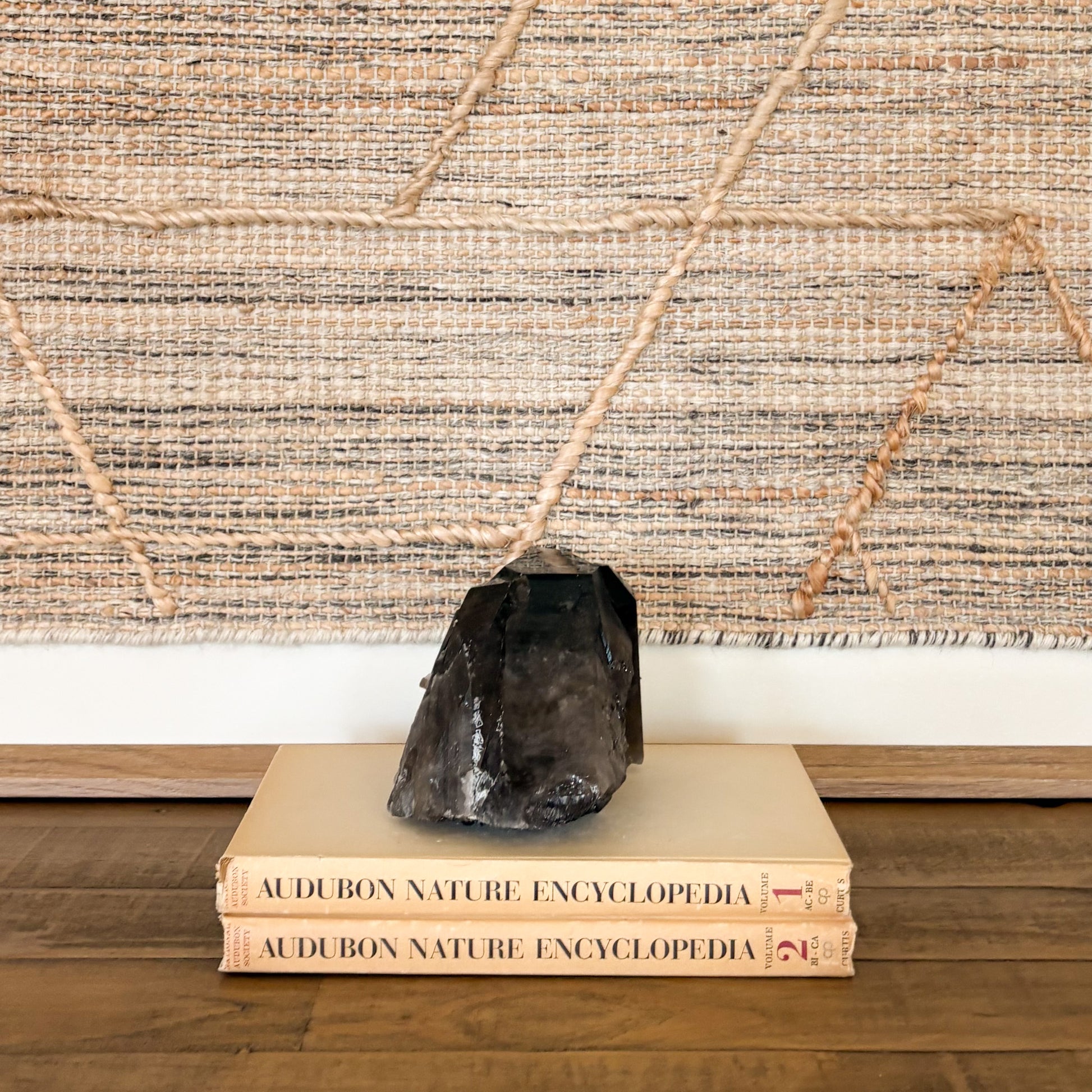 Natural smoky quartz crystal cluster used as elegant neutral home deco