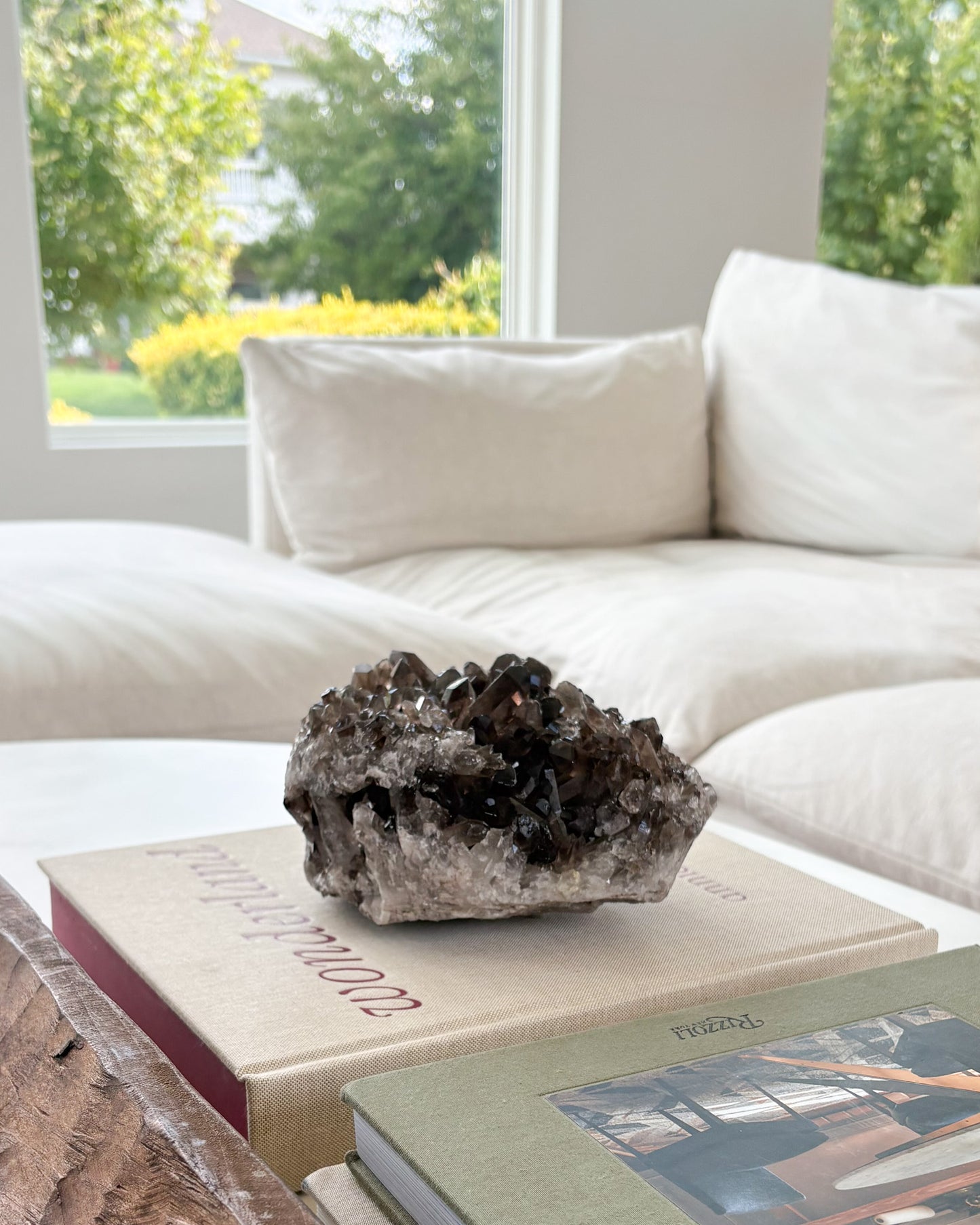 Natural smoky quartz crystal cluster from Brazil displayed as luxury shelf and coffee table décor