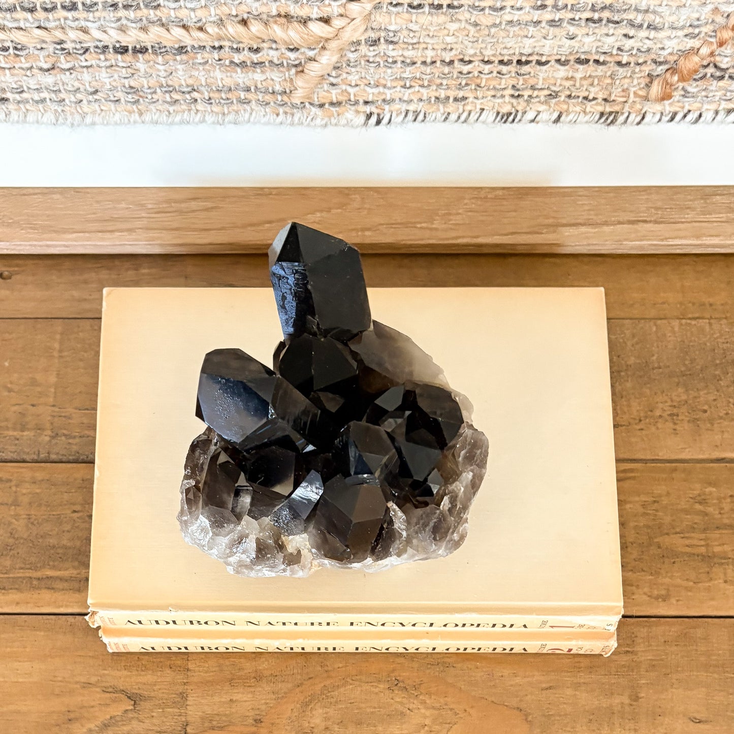 Smoky quartz crystal cluster displayed as modern boho home decor accent