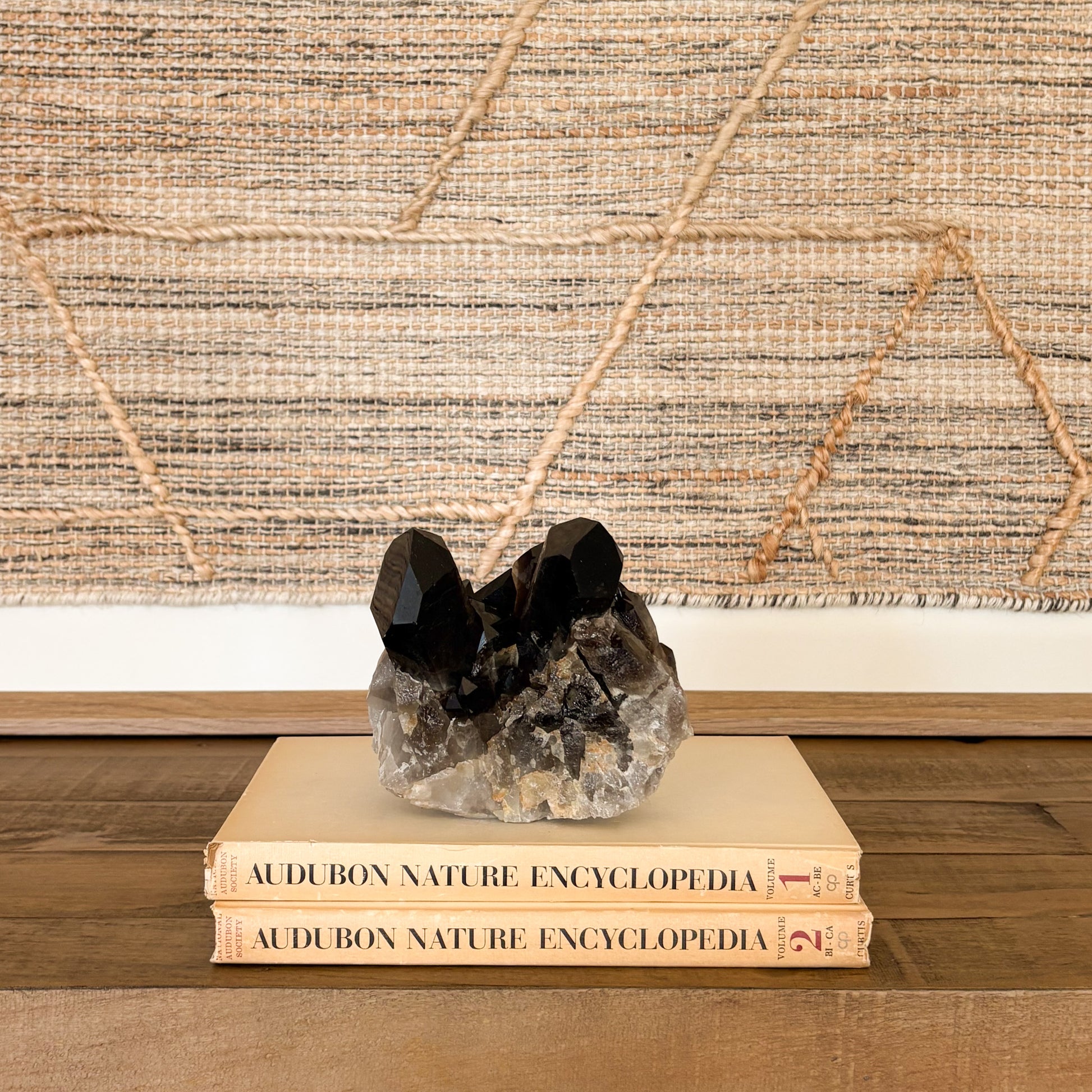 Smoky quartz crystal cluster used as natural home decor