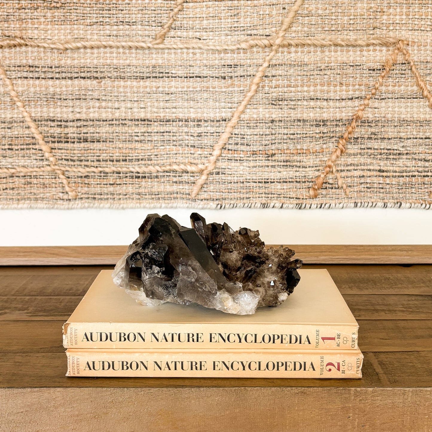 Smoky quartz crystal cluster used as natural home decor