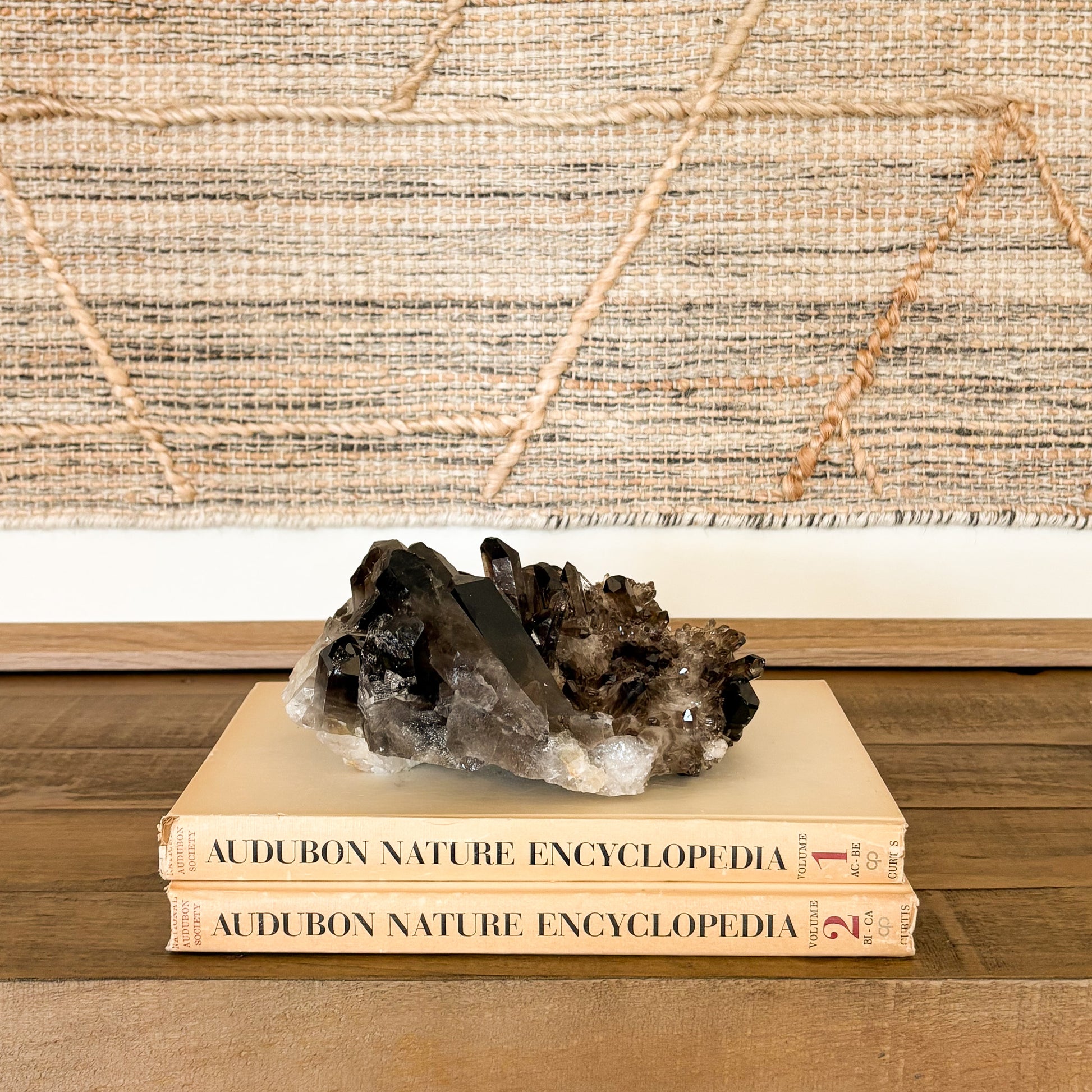 Smoky quartz crystal cluster used as natural home decor