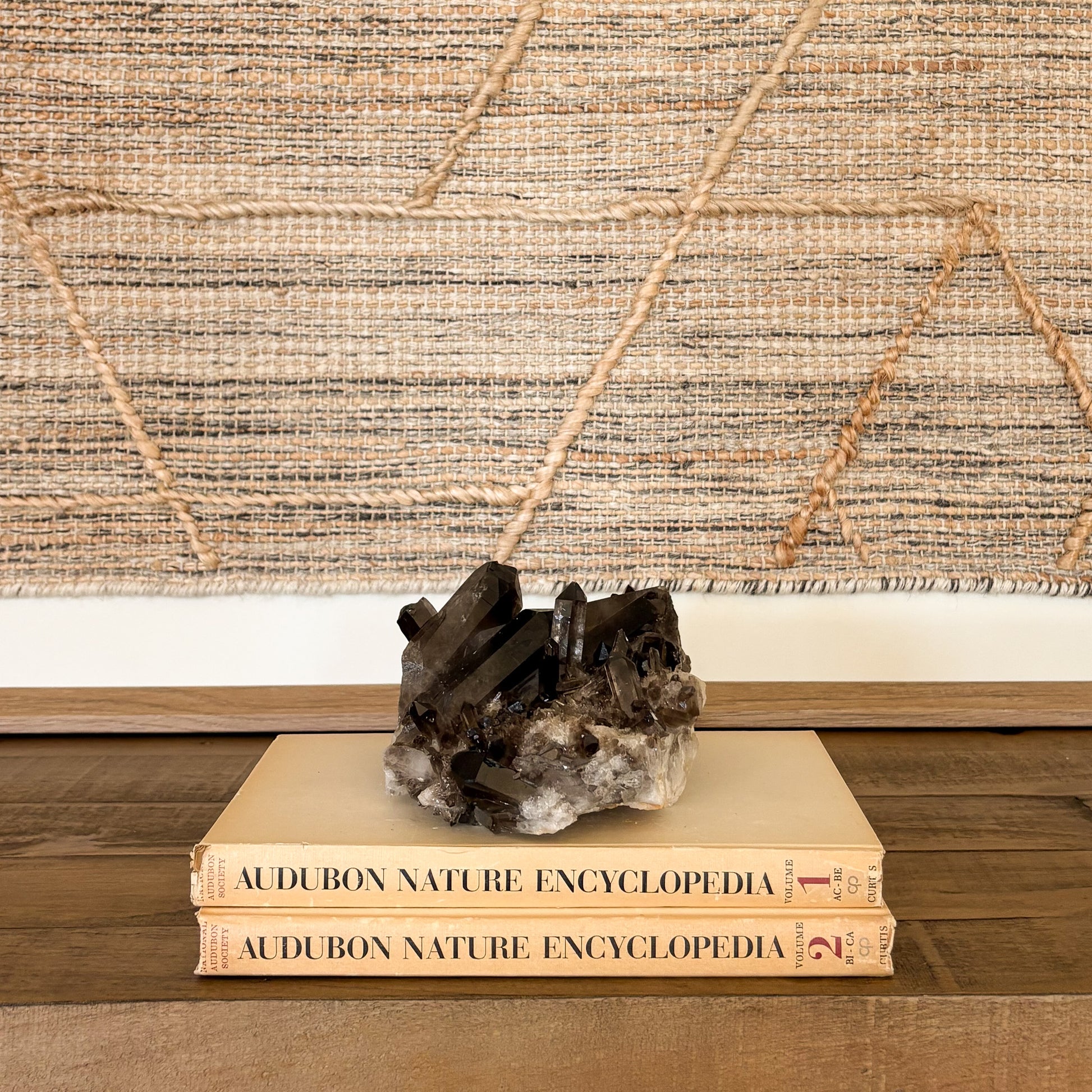 Raw smoky quartz crystal cluster with earthy brown crystals and natural formation