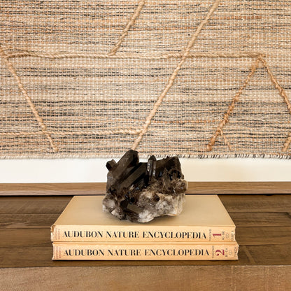 Raw smoky quartz crystal cluster with earthy brown crystals and natural formation