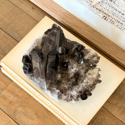 Smoky quartz crystal cluster home decor stone with natural brown tones and raw mineral texture