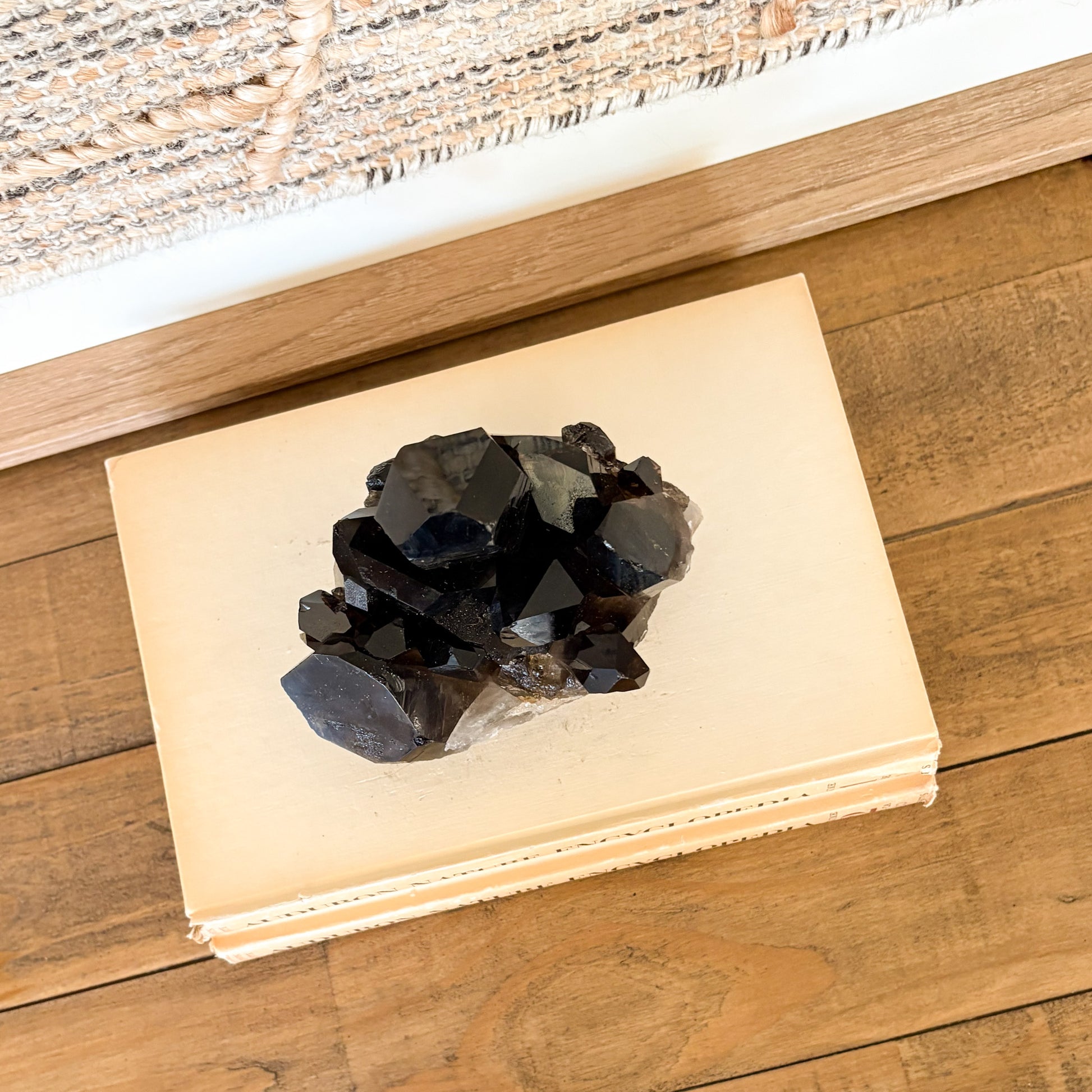 Polished smoky quartz crystal cluster statement piece for luxury home decor.