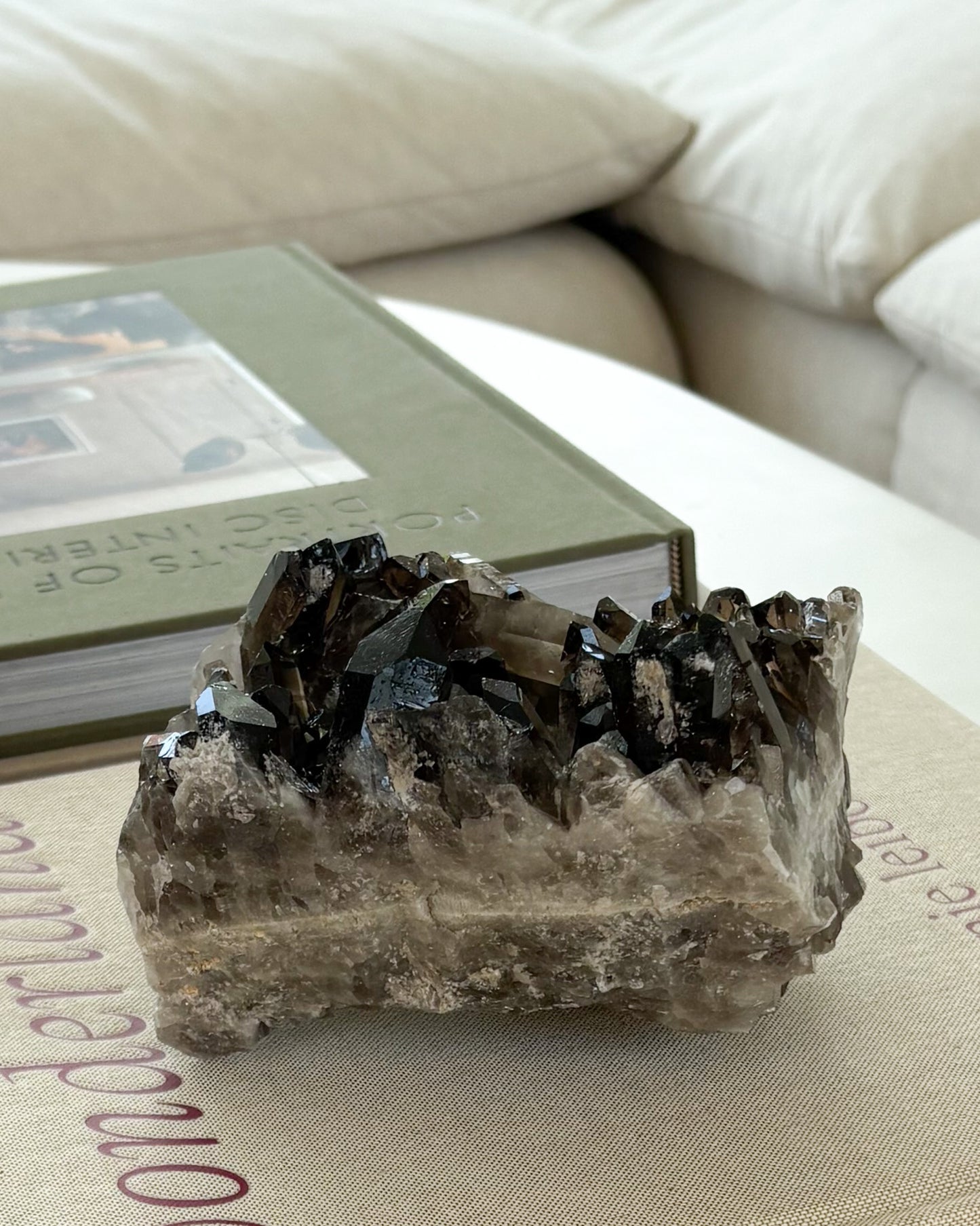 Raw smoky quartz crystal cluster with rich brown translucent crystal points