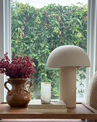 Sculptural white onyx candle holder for console tables and mantels