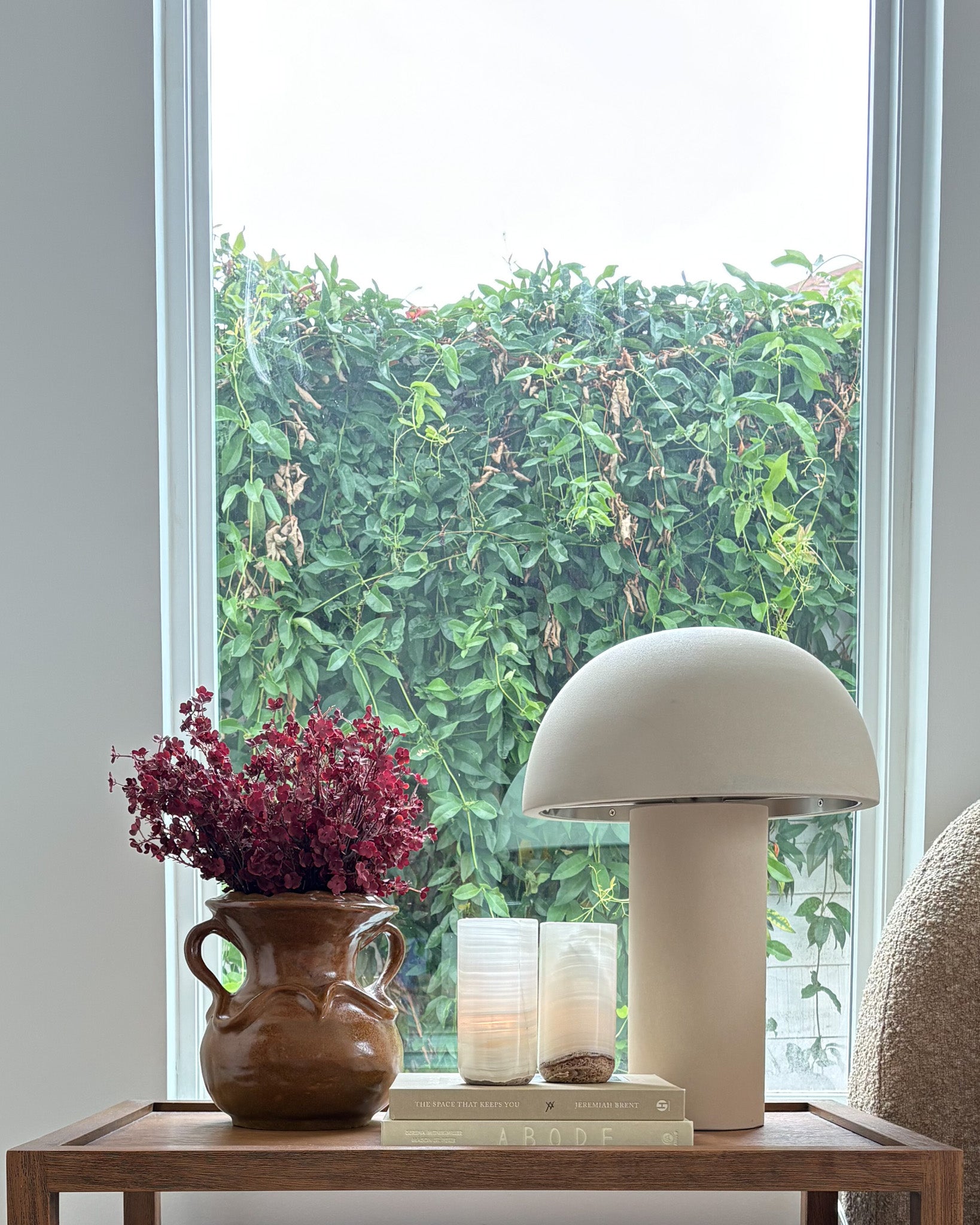 Modern white onyx candle holder with elegant cylindrical silhouette