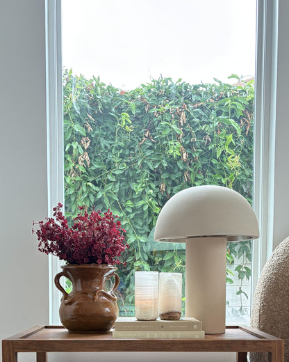 Modern white onyx candle holder with elegant cylindrical silhouette