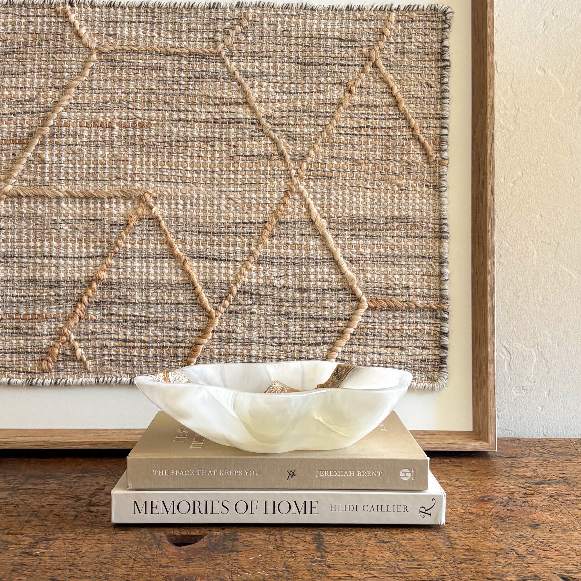 White onyx stone bowl with organic shape and smooth polished edge