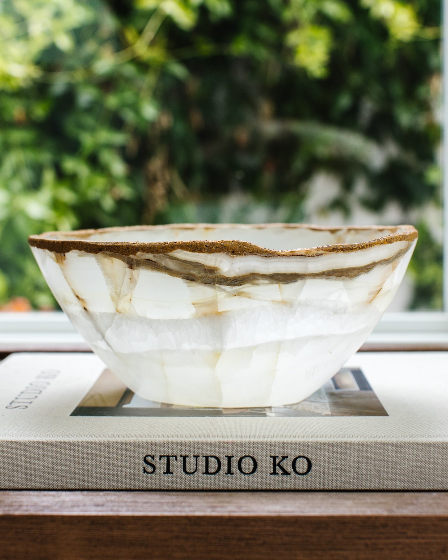 Hand carved white onyx bowl for modern organic coffee table styling
