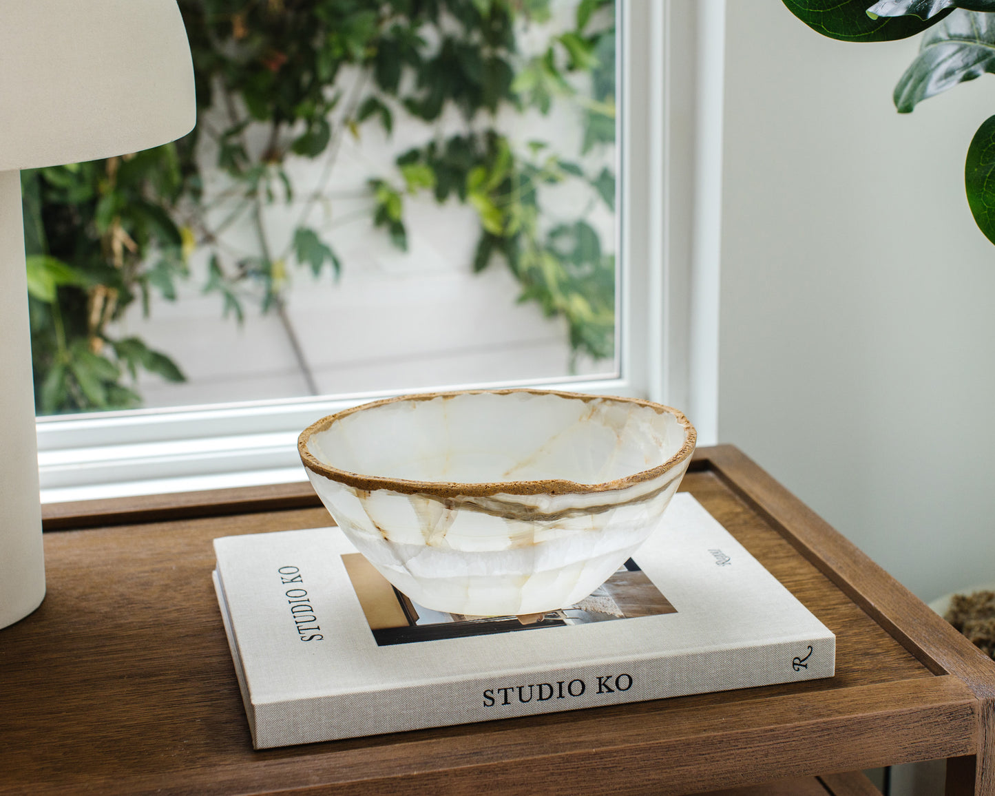 White onyx stone bowl with natural veining for elegant home decor