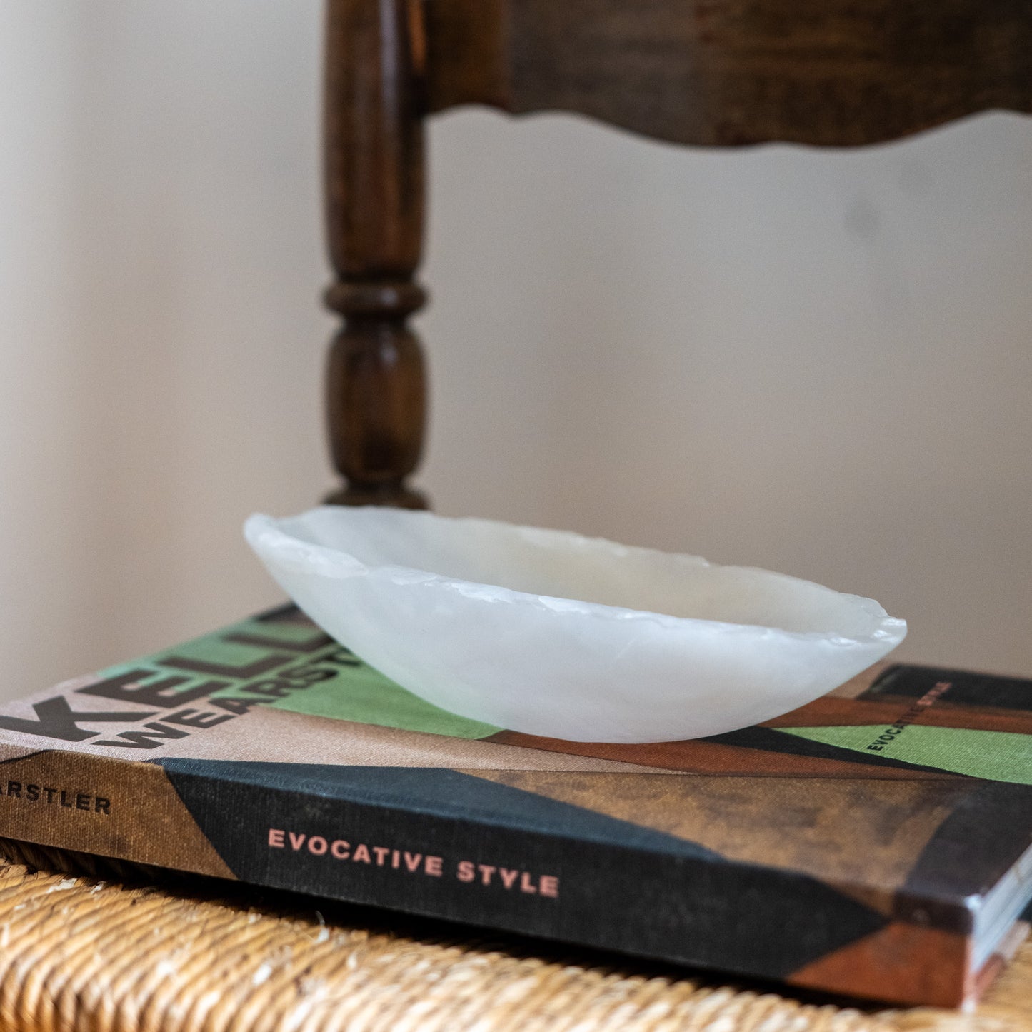 Elegant white onyx stone canoe centerpiece with natural veining and polished finish