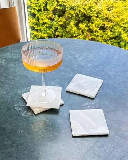 Luxury white onyx coaster set crafted from genuine natural stone for elegant home décor