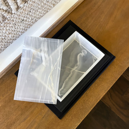 Rectangular translucent white onyx stone storage box with natural veining