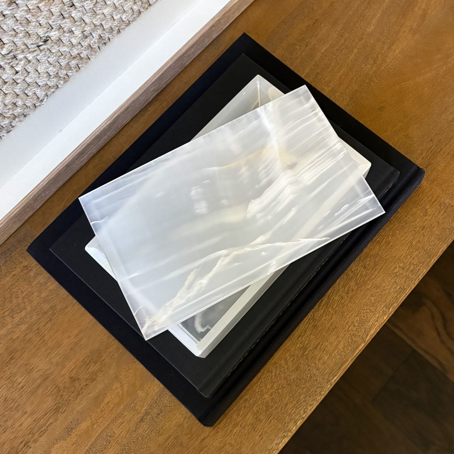 Minimalist white onyx lidded box styled with modern home decor