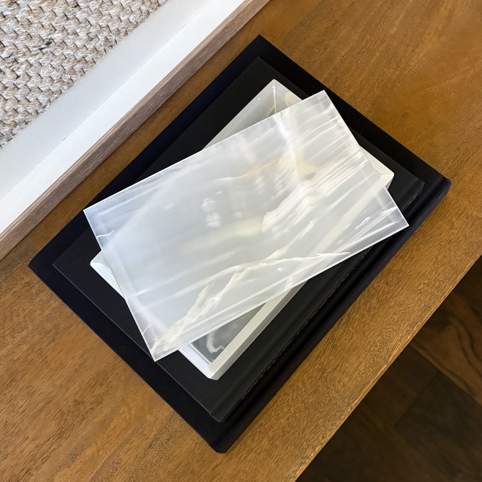 Minimalist white onyx lidded box styled with modern home decor