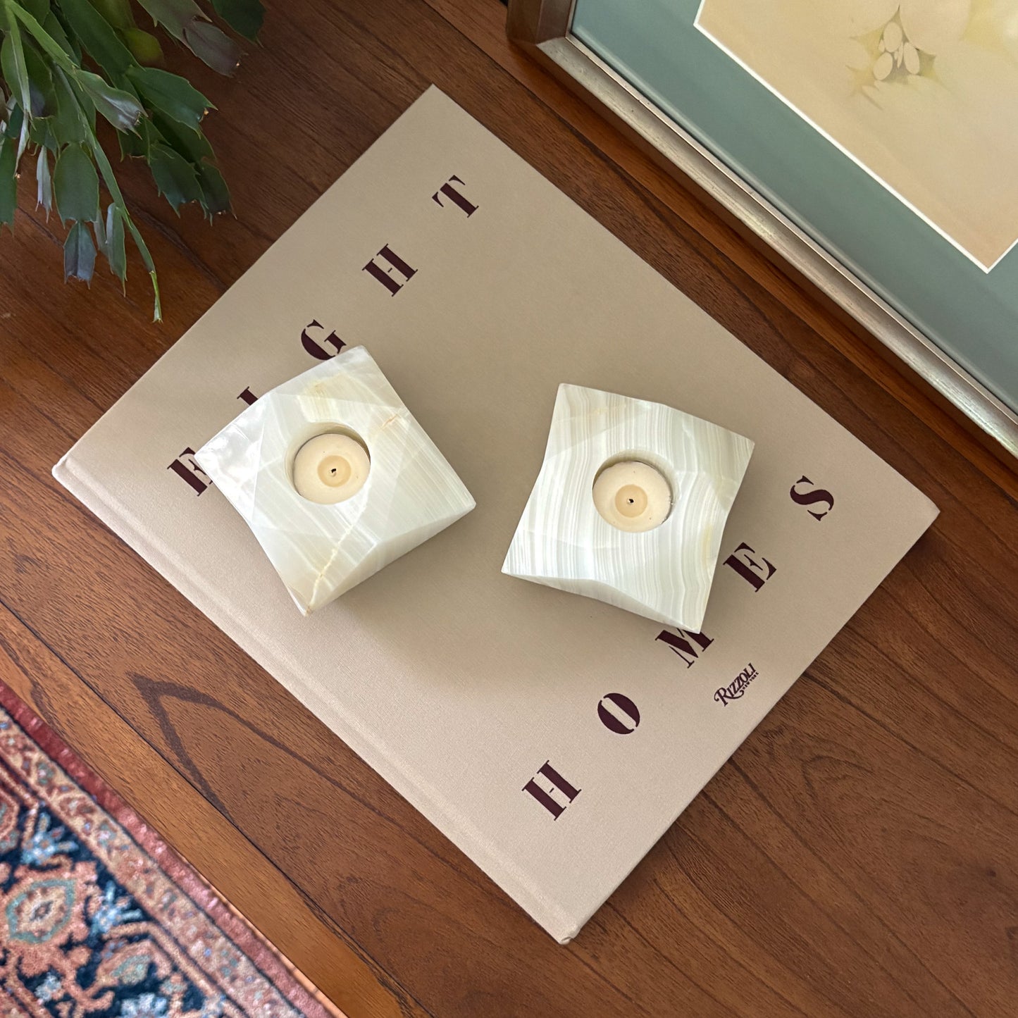 Luxury white onyx stone candle holders with warm glowing tealights