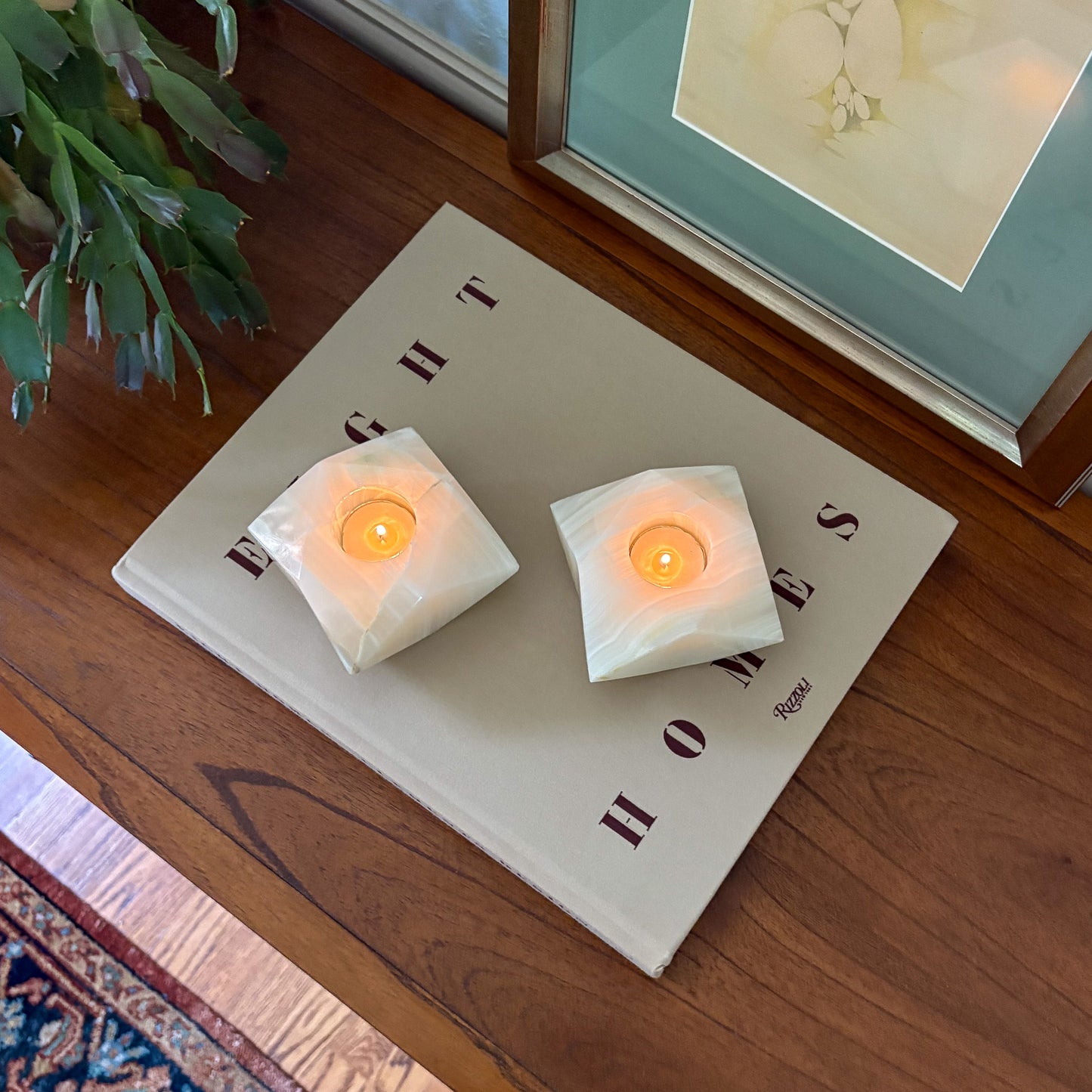 Handcrafted white onyx candle holders with soft ambient candlelight