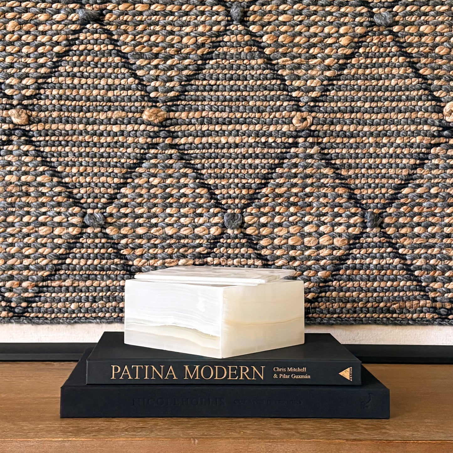 Open white onyx storage box displaying natural stone interior