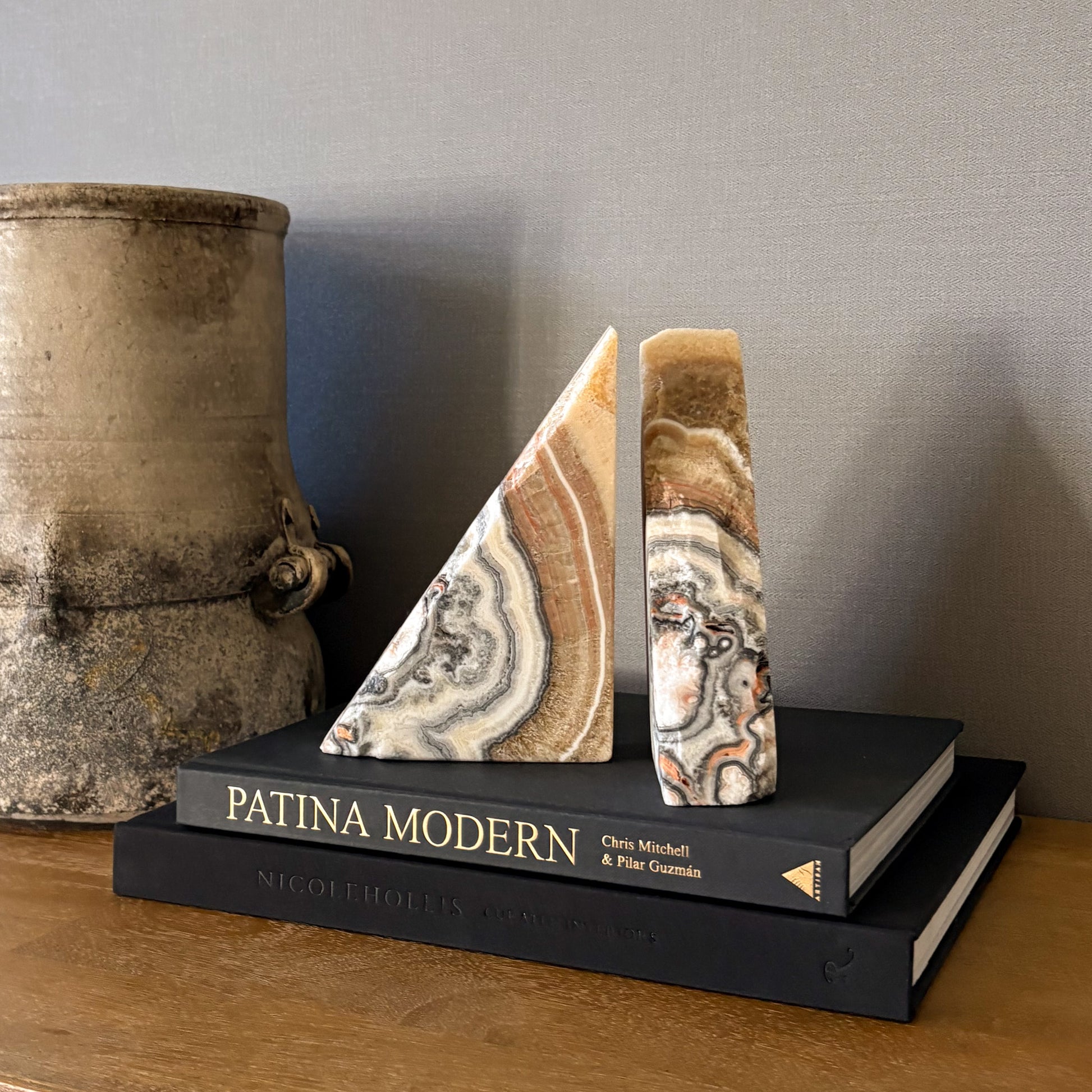 Artisan carved zebra calcite bookends with natural layered stone pattern neutral modern shelf decor