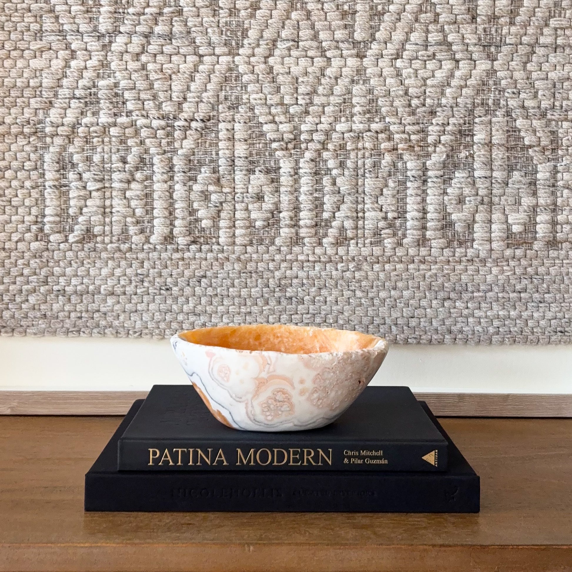 Decorative zebra calcite bowl with organic banding and polished finish, styled home accent piece