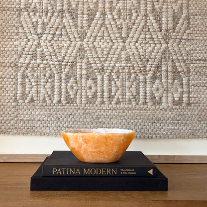 Artisan zebra calcite stone bowl with unique striped mineral pattern, modern interior decor