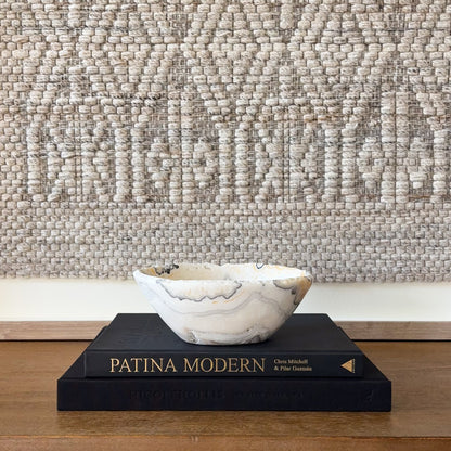 Zebra calcite bowl with natural black and white banding, polished decorative crystal dish