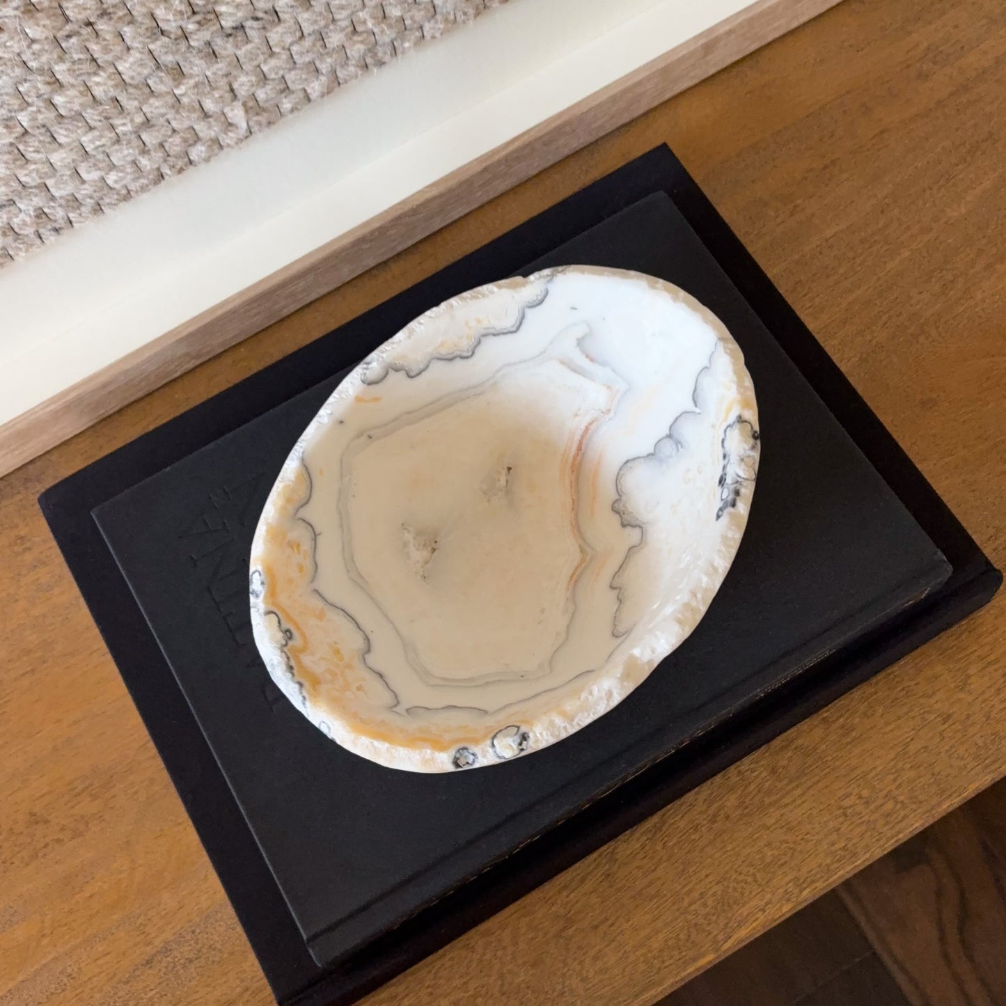 Artisan zebra calcite bowl showcasing layered black and white calcite crystal patterns