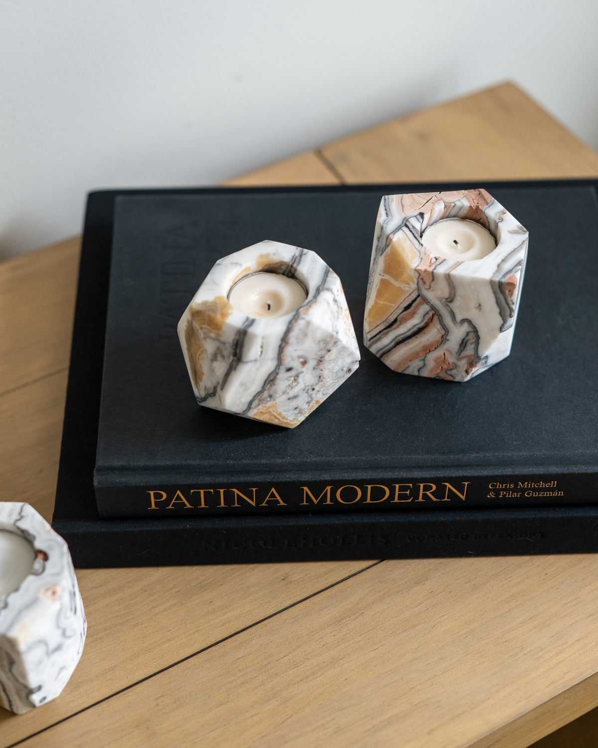 Zebra calcite candle holder with natural banding and sculptural hand-carved form