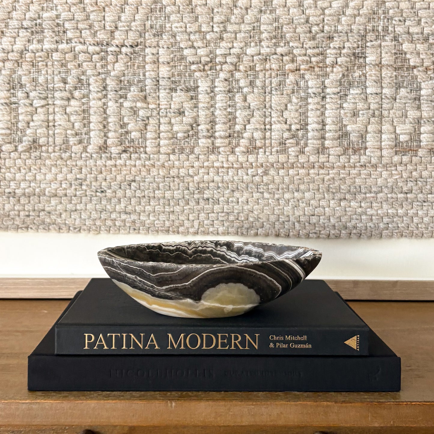 Hand carved small zebra onyx bowl in polished black and white natural stone, luxury decorative accent for elegant interiors